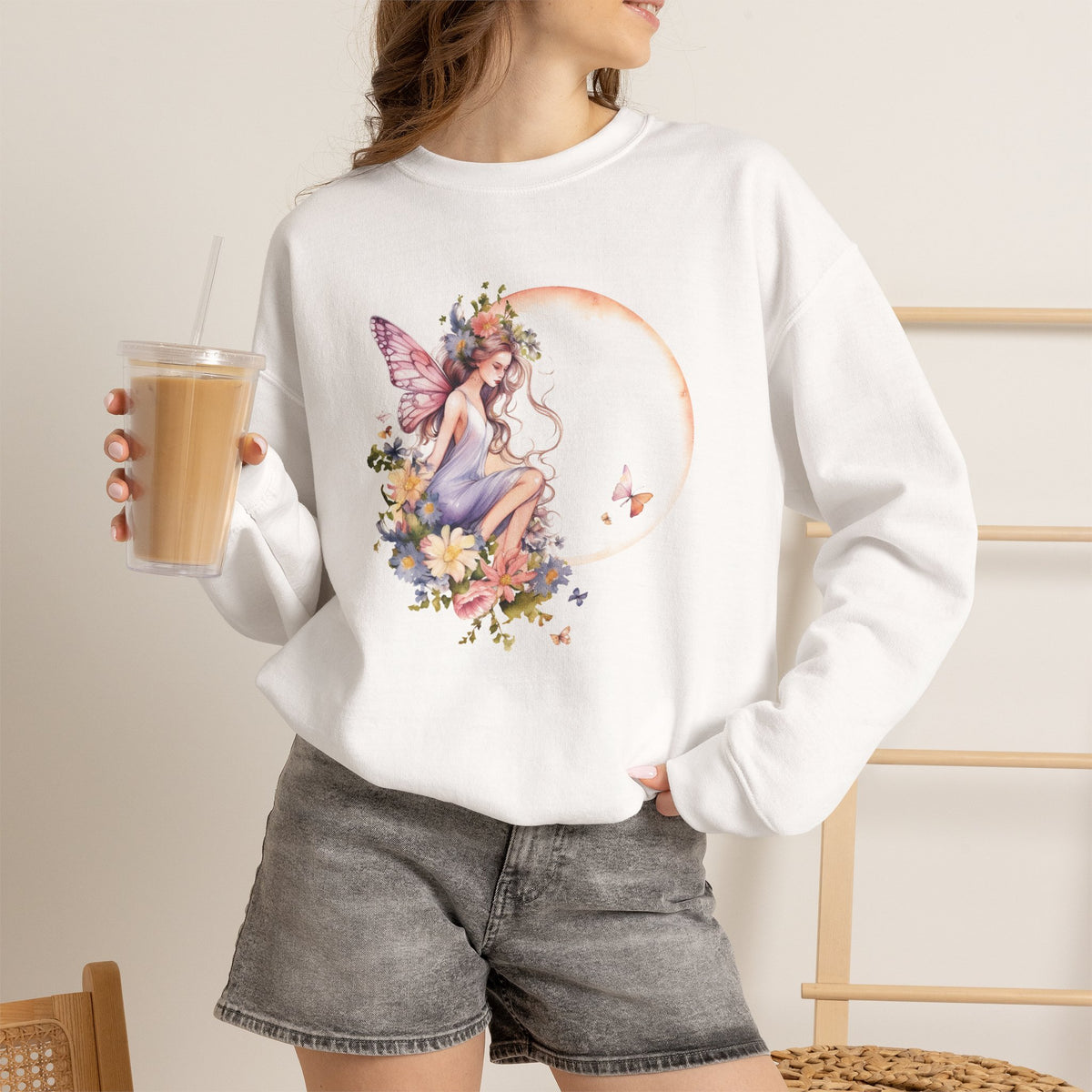Floral Fairy Sitting on Crescent Moon